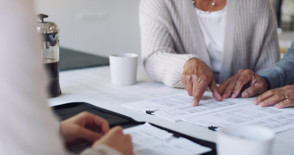 people looking at paperwork