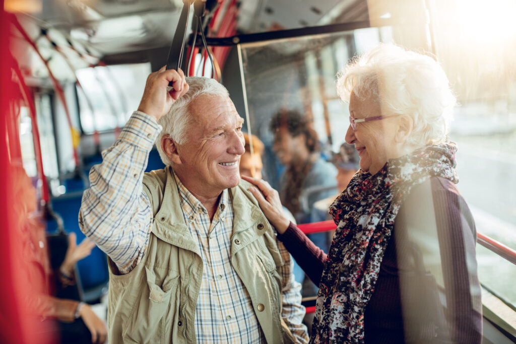 Mature couple riding in a bus