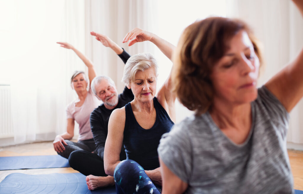 A group of women doing yoga