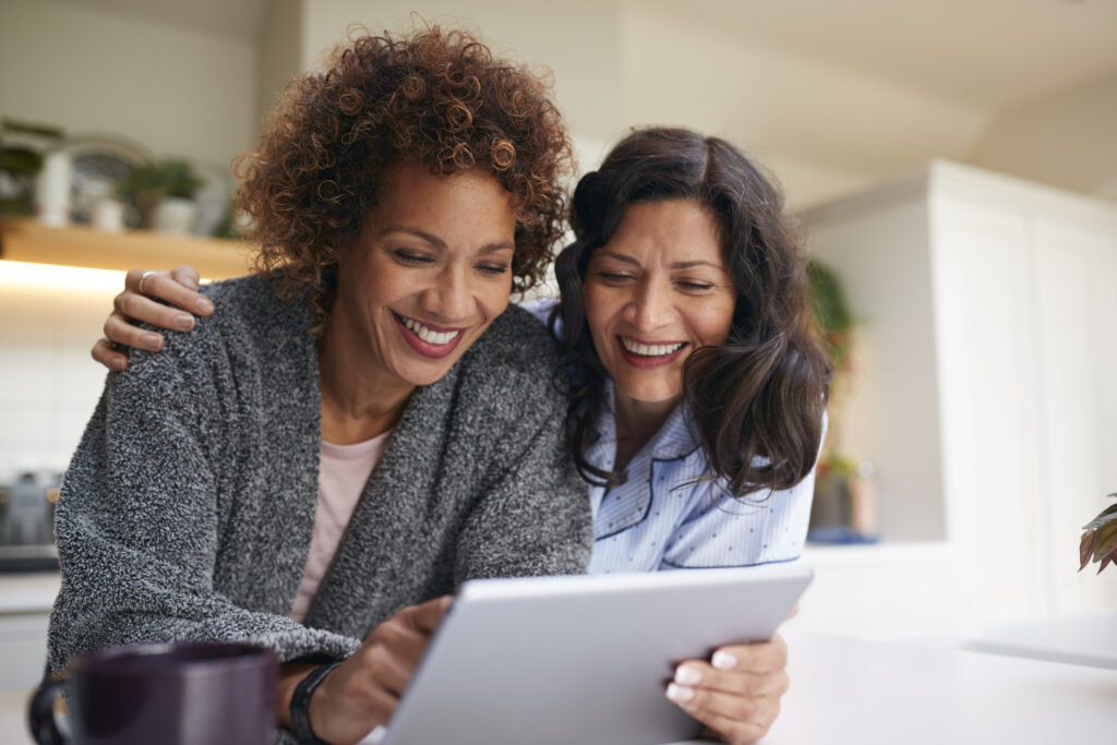 Two females using a tablet
