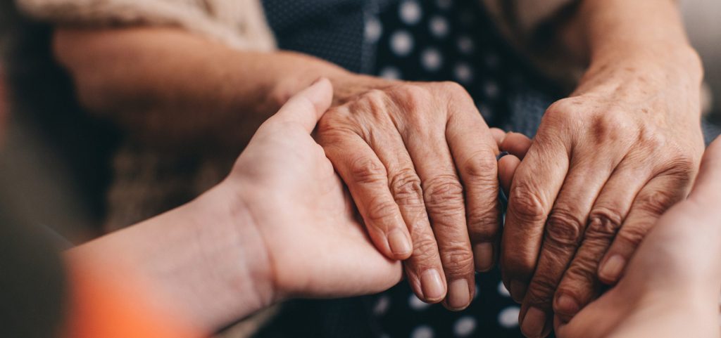 two people holding hands