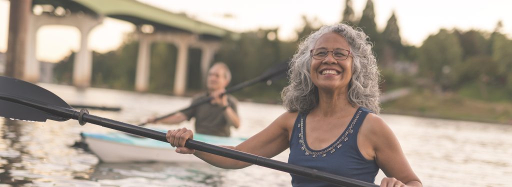 older woman kayaking